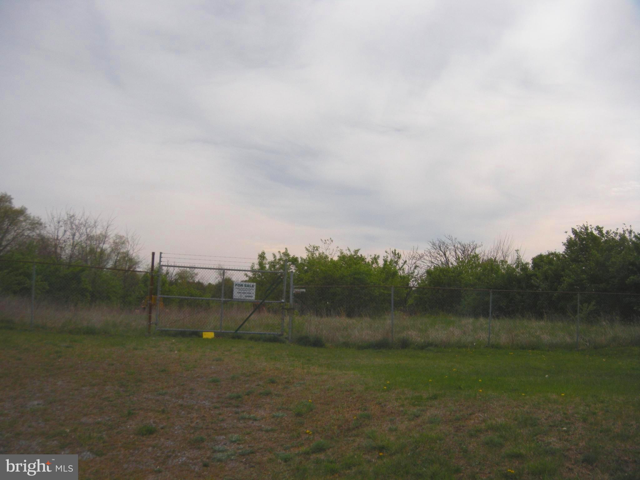 1549 Front Royal Pike Winchester, VA 22602 - Photo 1 of 20 a view of a field with trees in the background