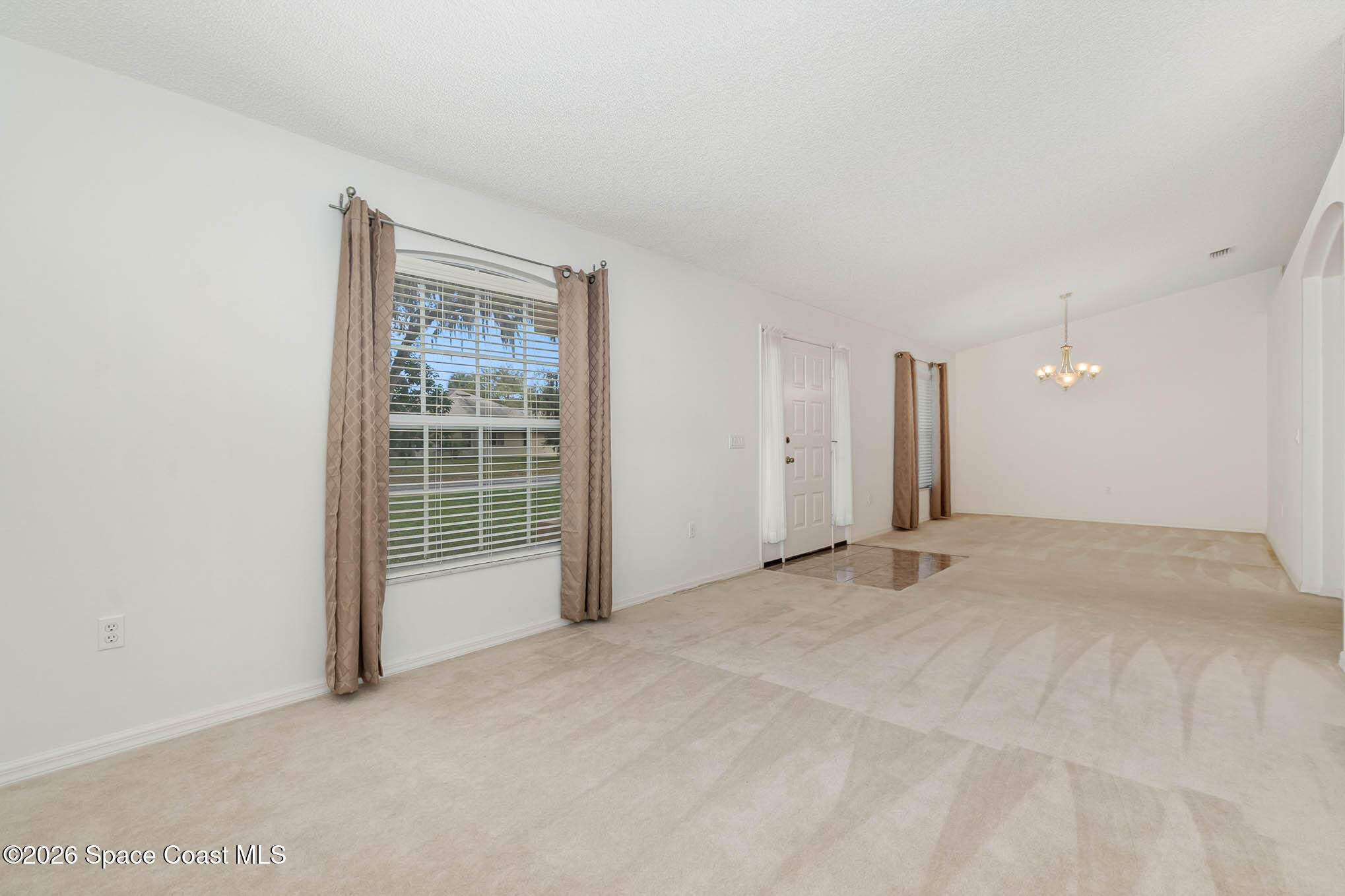 787 Seymour Road Northeast Palm Bay, FL 32905 - Photo 6 of 15 Living-Dining Rooms