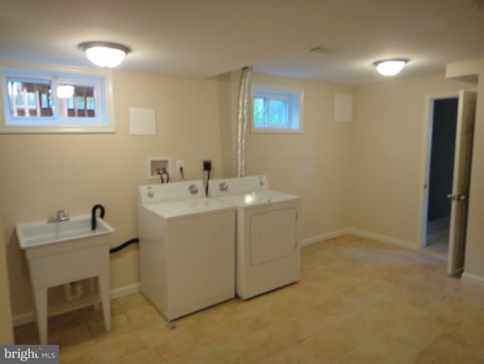 7111 Loisdale Road Springfield, VA 22150 - Photo 8 of 20 Large Basement Laundry Room