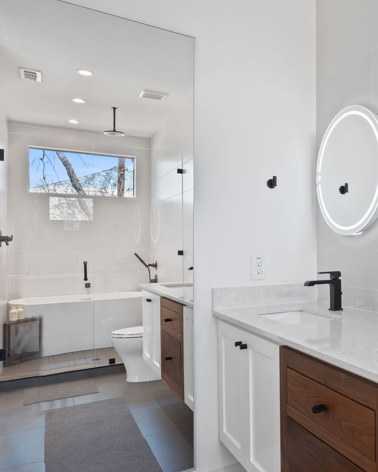 308 Onion Street Austin, TX 78702 - Photo 26 of 40 a bathroom with a double vanity sink mirror and bathtub