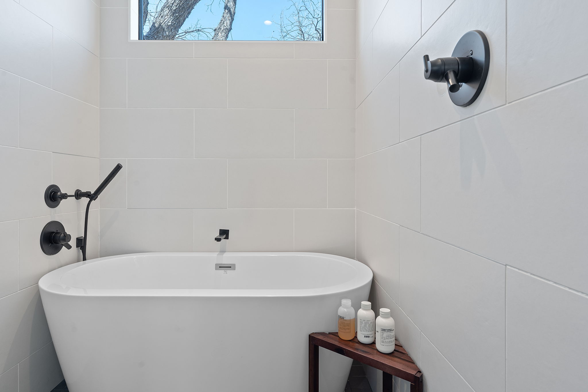 308 Onion Street Austin, TX 78702 - Photo 27 of 40 a bathroom with a sink and a mirror