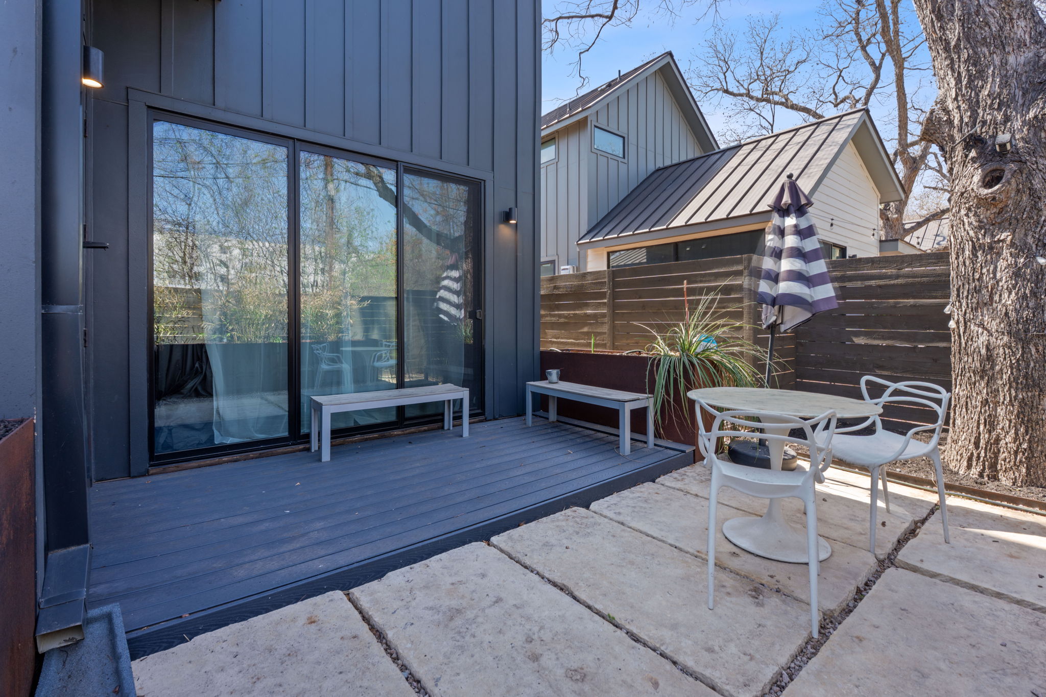 308 Onion Street Austin, TX 78702 - Photo 37 of 40 a view of a patio with a table and chairs