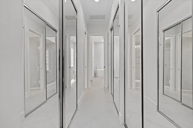 a view of a bathroom from the hallway