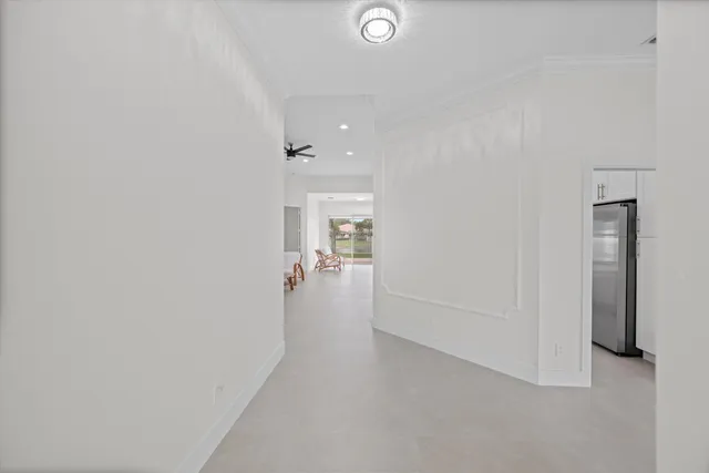 a view of a hallway with closet