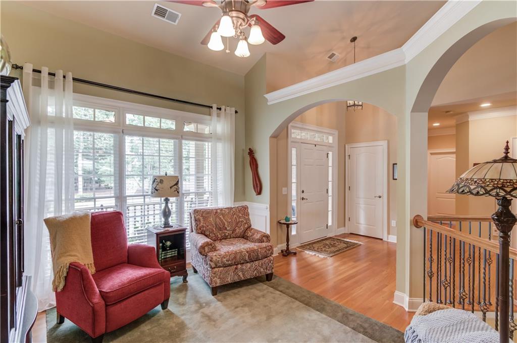 901 Providence Lane Monroe, GA 30656 - Photo 16 of 76 a living room with furniture and a large window