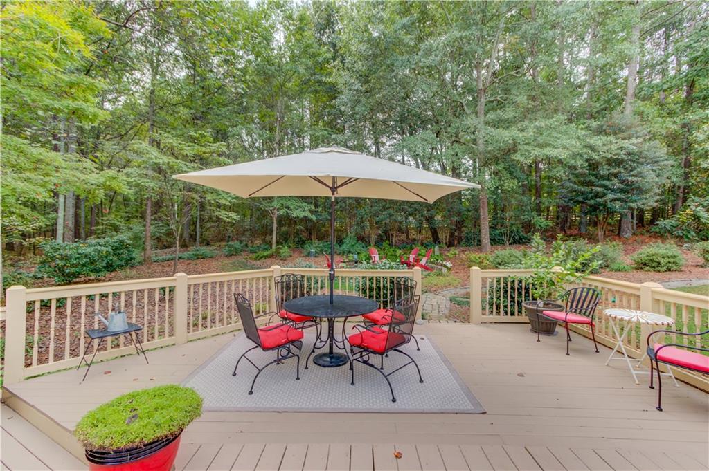 901 Providence Lane Monroe, GA 30656 - Photo 53 of 76 a view of a chairs and table in the terrace