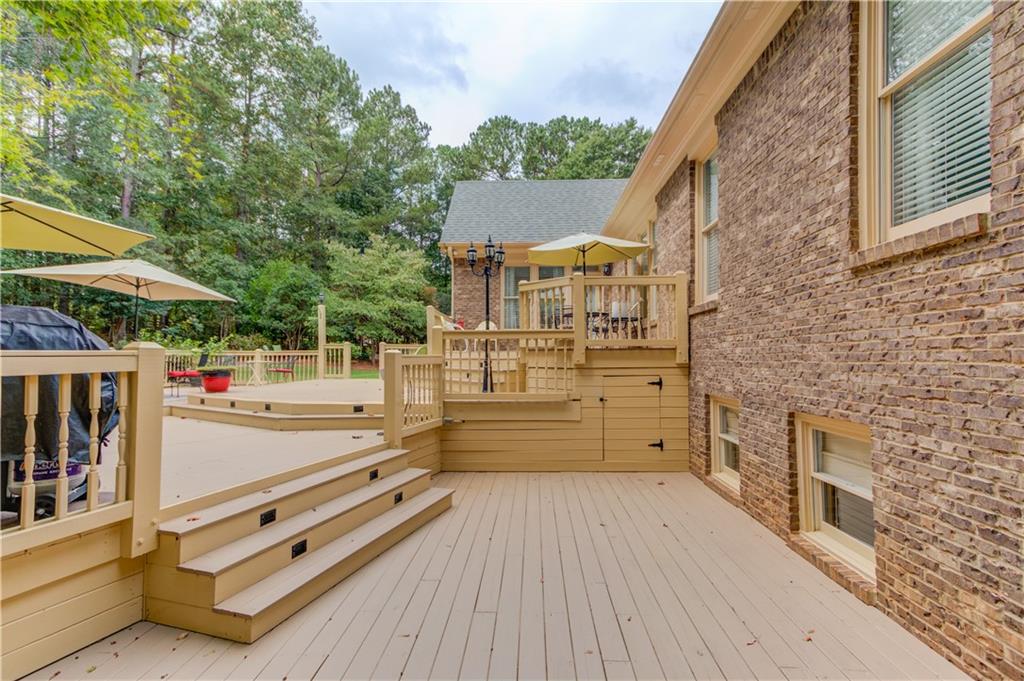 901 Providence Lane Monroe, GA 30656 - Photo 56 of 76 swimming pool view with a outdoor seating