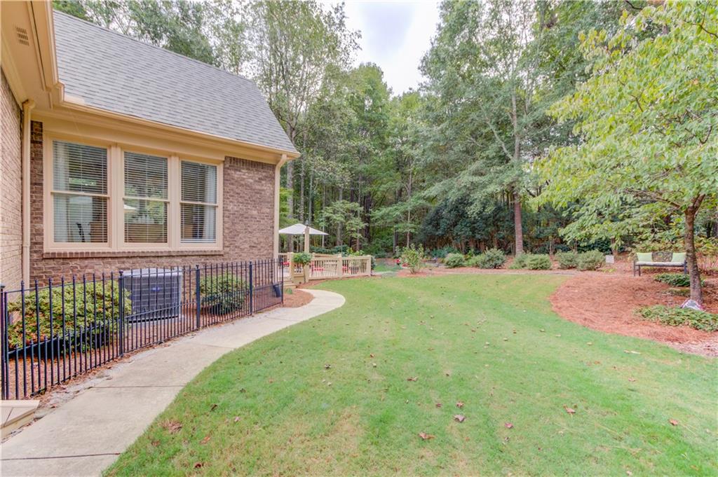 901 Providence Lane Monroe, GA 30656 - Photo 57 of 76 a view of house with backyard