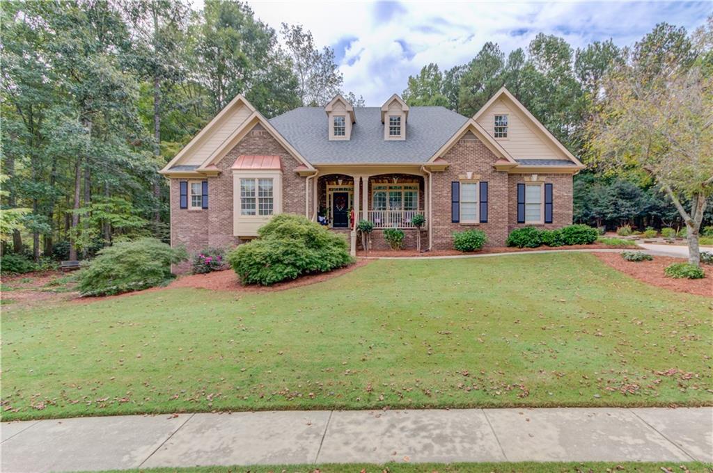 901 Providence Lane Monroe, GA 30656 - Photo 66 of 76 a front view of a house with a yard