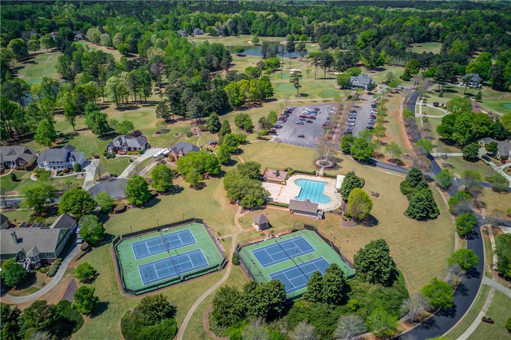 901 Providence Lane Monroe, GA 30656 - Photo 8 of 76 an aerial view of a house with yard swimming pool and outdoor seating