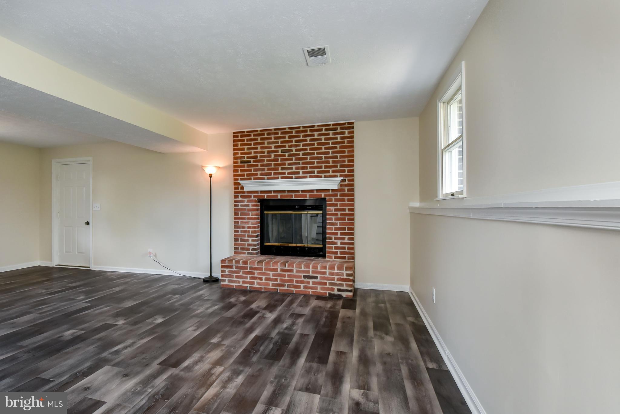 1308 Leeds Road Elkton, MD 21921 - Photo 24 of 28 Lower level family room. Gas FP.