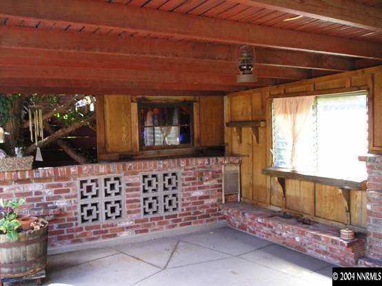 1400 Monroe Street Reno, NV 89509 - Photo 2 of 4 a front view of a house with a large window