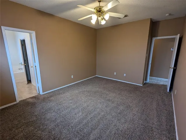 an empty room with a mirror