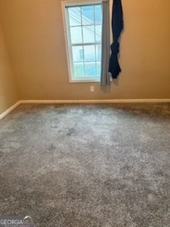 2555 Flat Shoals Road, Unit 801 South Fulton, GA 30349 - Photo 15 of 25 an empty room with a window