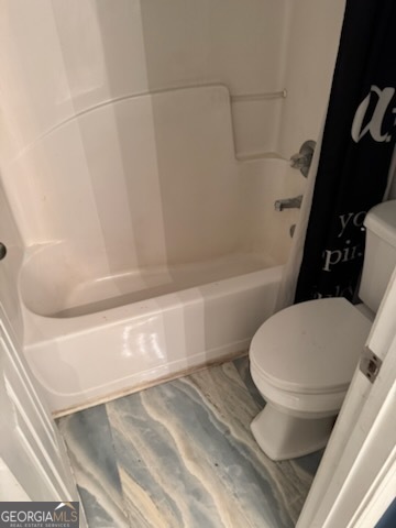 2555 Flat Shoals Road, Unit 801 South Fulton, GA 30349 - Photo 19 of 25 a bathroom with a toilet and a bathtub