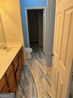 2555 Flat Shoals Road, Unit 801 South Fulton, GA 30349 - Photo 6 of 25 a bathroom with a sink and a mirror