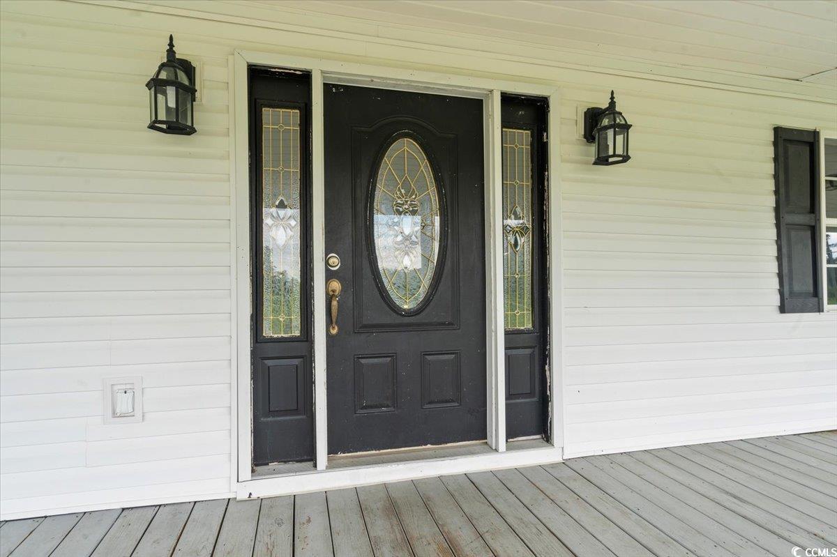 148 High Hill Road Lake View, SC 29563 - Photo 8 of 40 Entrance to property featuring a deck