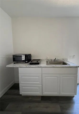 a close view of appliances and cabinets