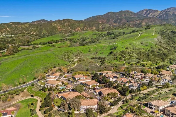a view of a city with mountains in the background
