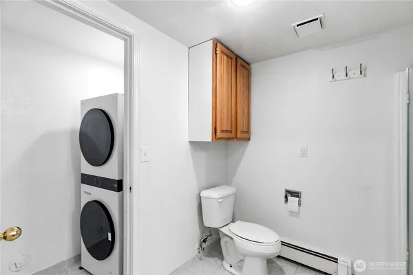 a bathroom with a toilet and a sink