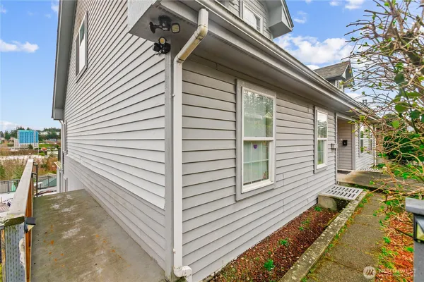 a view of a balcony with furniture