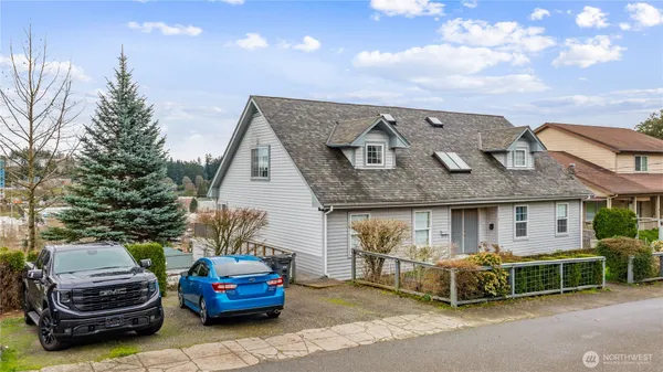 a car parked in front of a house