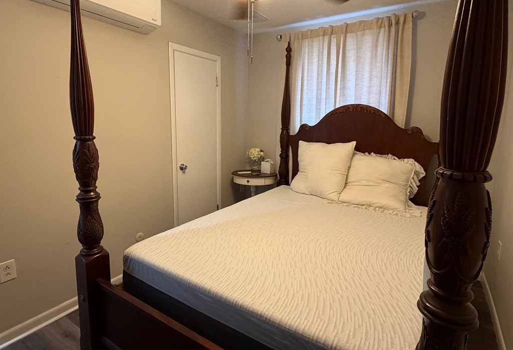 3121 Bellanca Street Columbus, GA 31909 - Photo 16 of 35 a bedroom with a bed and a window