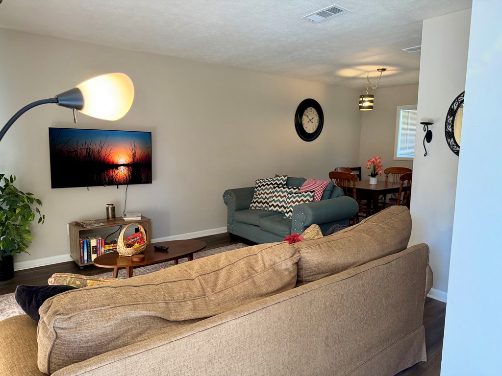 3121 Bellanca Street Columbus, GA 31909 - Photo 21 of 35 a living room with furniture and a flat screen tv