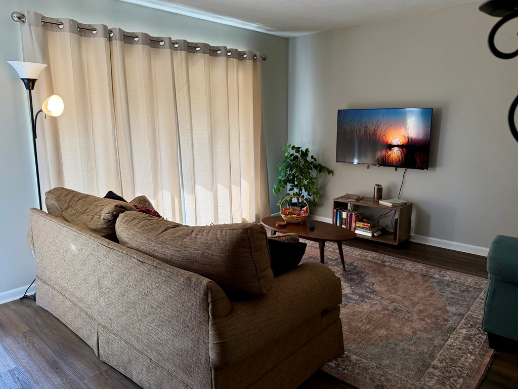 3121 Bellanca Street Columbus, GA 31909 - Photo 22 of 35 a living room with furniture and a flat screen tv