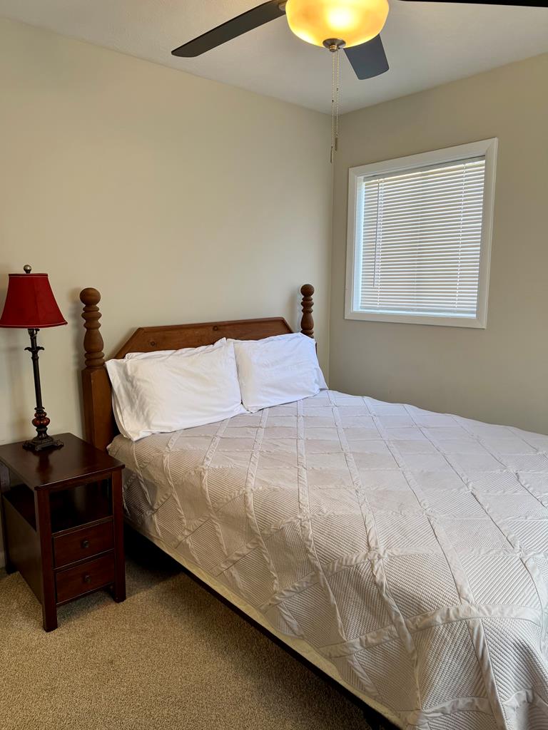 3121 Bellanca Street Columbus, GA 31909 - Photo 29 of 35 a bedroom with a bed and lamps