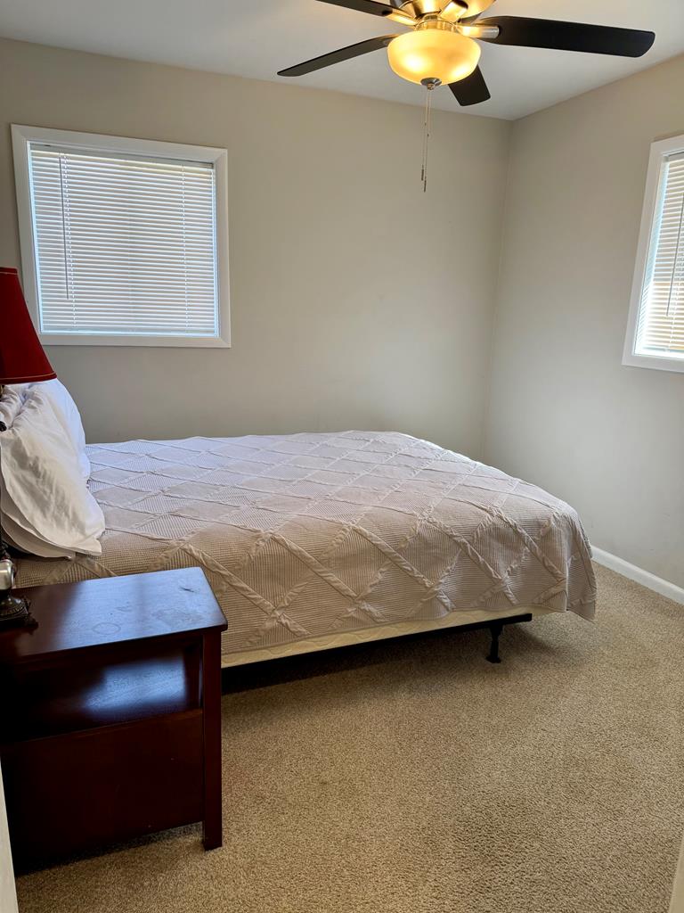 3121 Bellanca Street Columbus, GA 31909 - Photo 30 of 35 a bedroom with a bed and window