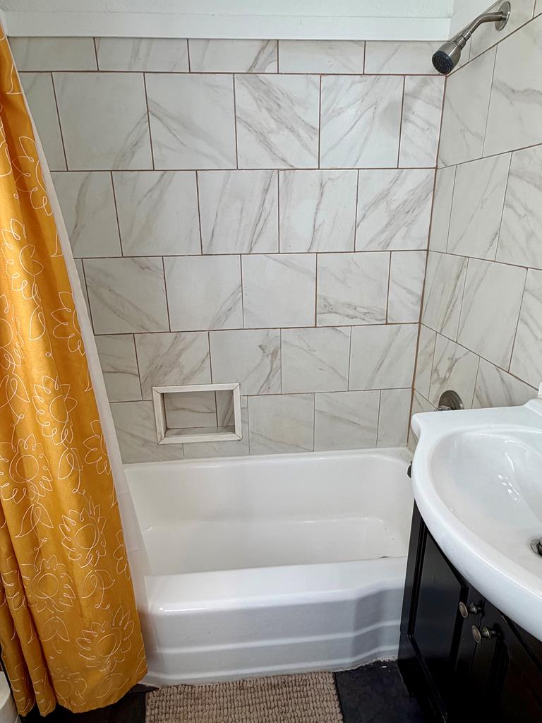 3121 Bellanca Street Columbus, GA 31909 - Photo 35 of 35 a bathroom with a sink and bathtub