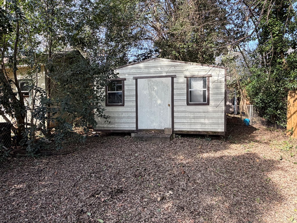 3121 Bellanca Street Columbus, GA 31909 - Photo 7 of 35 a front view of a house with a yard