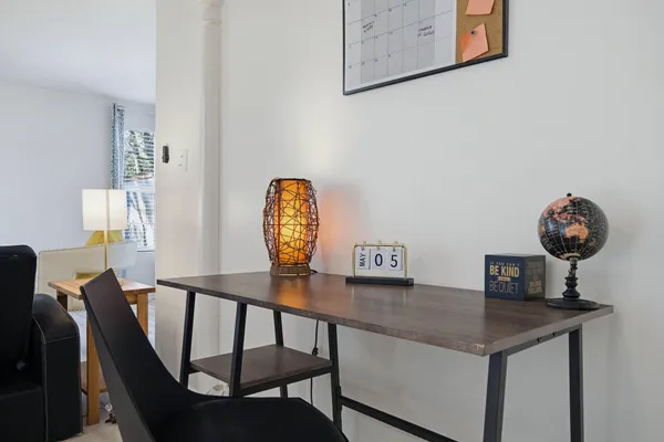 a view of a dining room with furniture