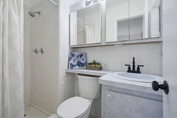 a bathroom with a sink and mirror