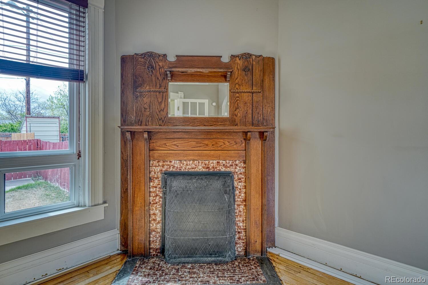 131 E Street Salida, CO 81201 - Photo 11 of 35 a brick house with a fireplace