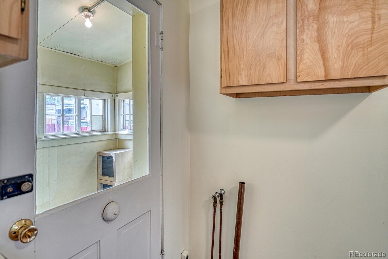 131 E Street Salida, CO 81201 - Photo 14 of 35 a bathroom with a sink and a mirror