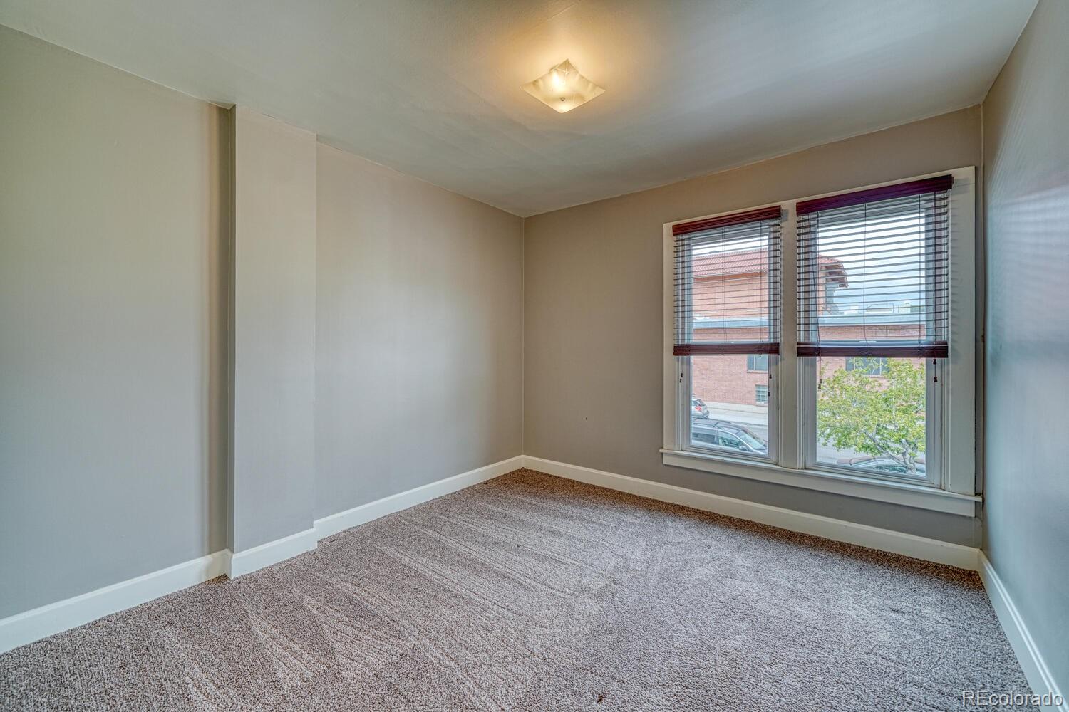 131 E Street Salida, CO 81201 - Photo 20 of 35 an empty room with a window