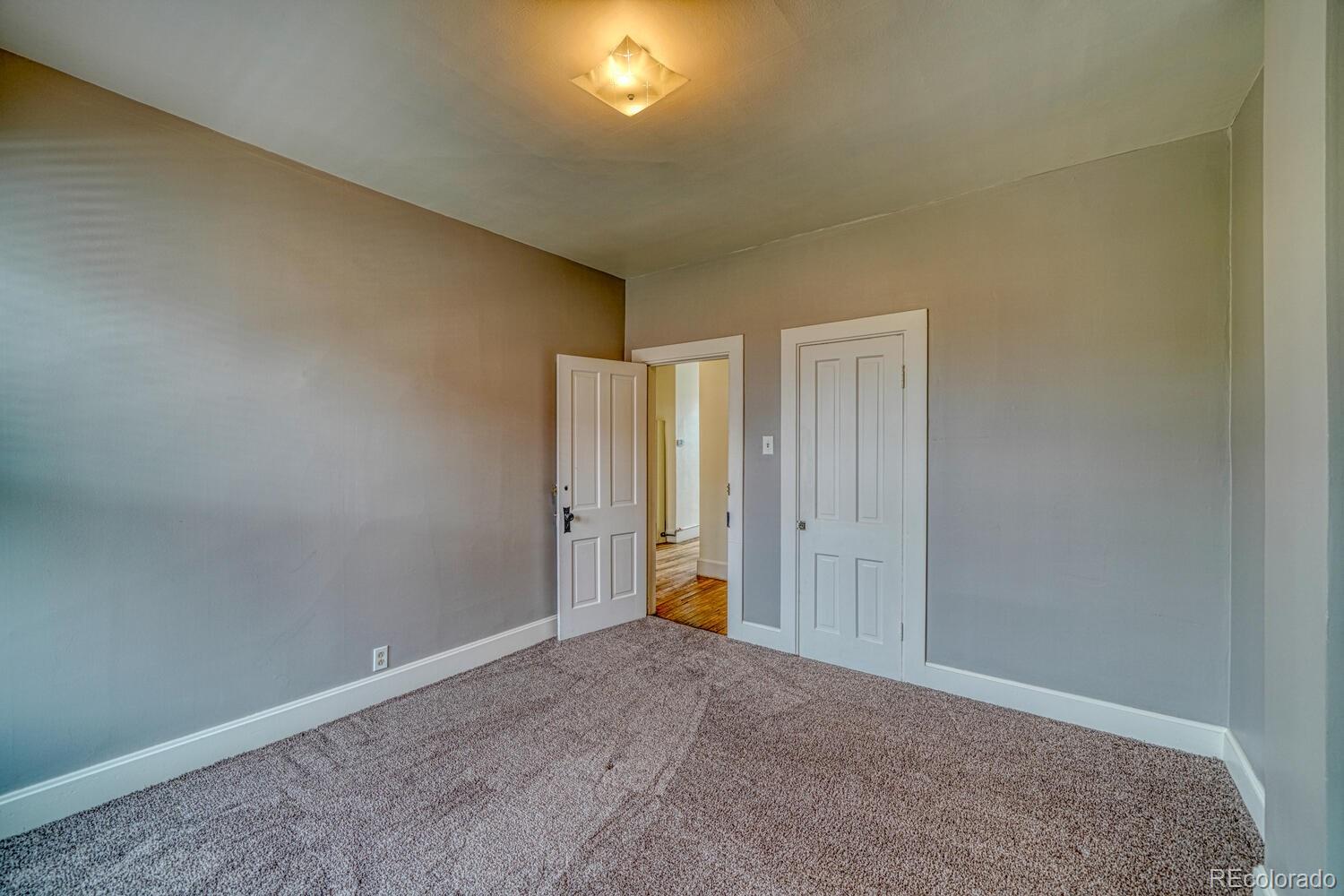 131 E Street Salida, CO 81201 - Photo 21 of 35 a view of an empty room and a window