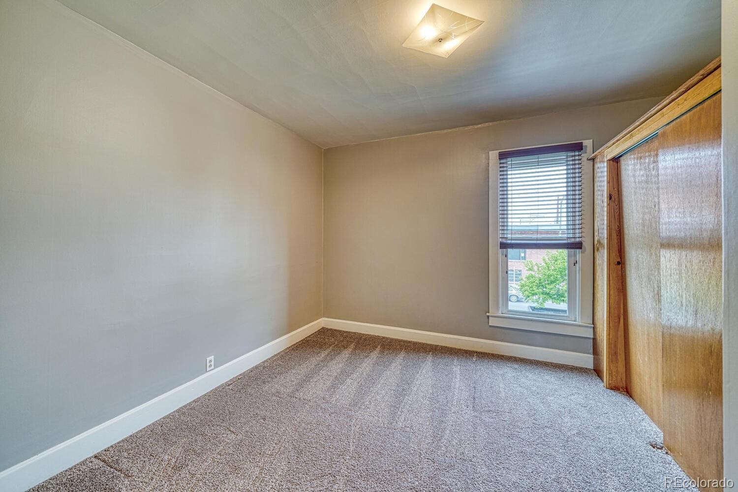 131 E Street Salida, CO 81201 - Photo 26 of 35 an empty room with windows