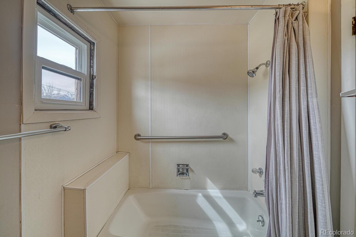 131 E Street Salida, CO 81201 - Photo 28 of 35 a bathroom with a bathtub