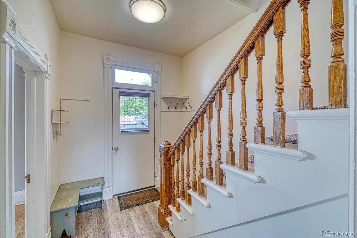 131 E Street Salida, CO 81201 - Photo 5 of 35 a view of front door with stairs