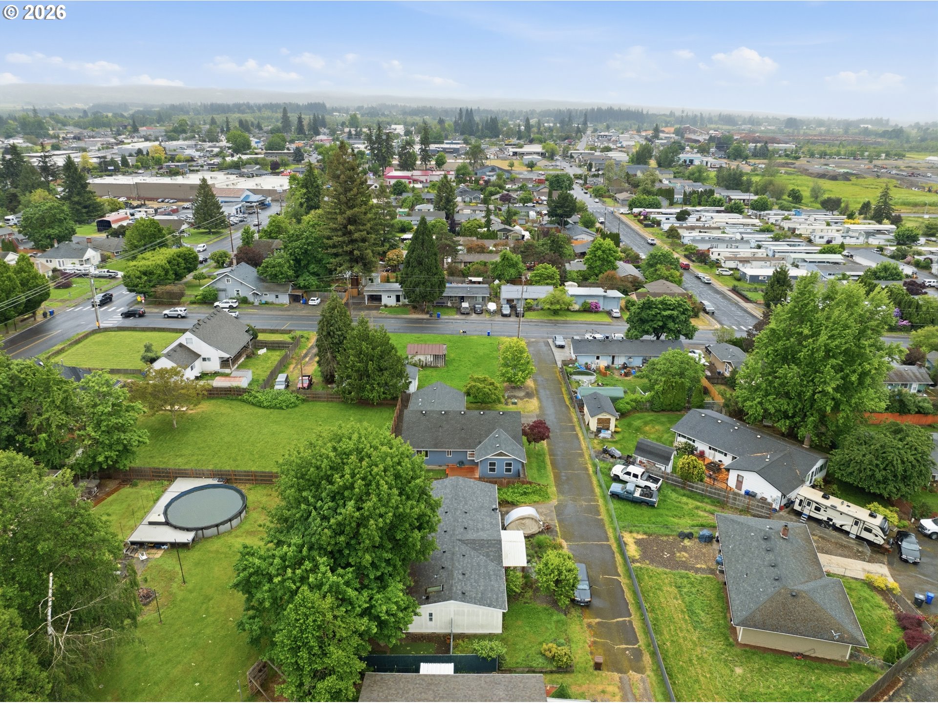 105 Toliver Road Molalla, OR 97038 - Photo 32 of 34 an aerial view of residential houses with outdoor space and river