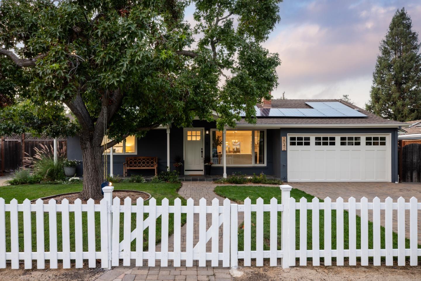 2042 Crist Drive Los Altos, CA 94024 - Photo 1 of 24 a front view of house with a garden
