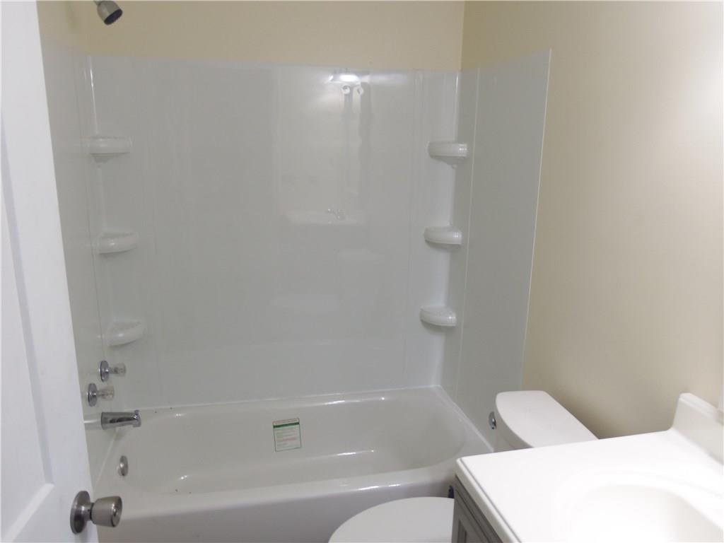636 Wilson Mill Road New Castle, PA 16105 - Photo 18 of 18 a bathroom with a bathtub and shower