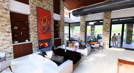 a view of living room with furniture and floor to ceiling window