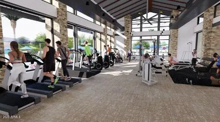 a living room with furniture and floor to ceiling windows