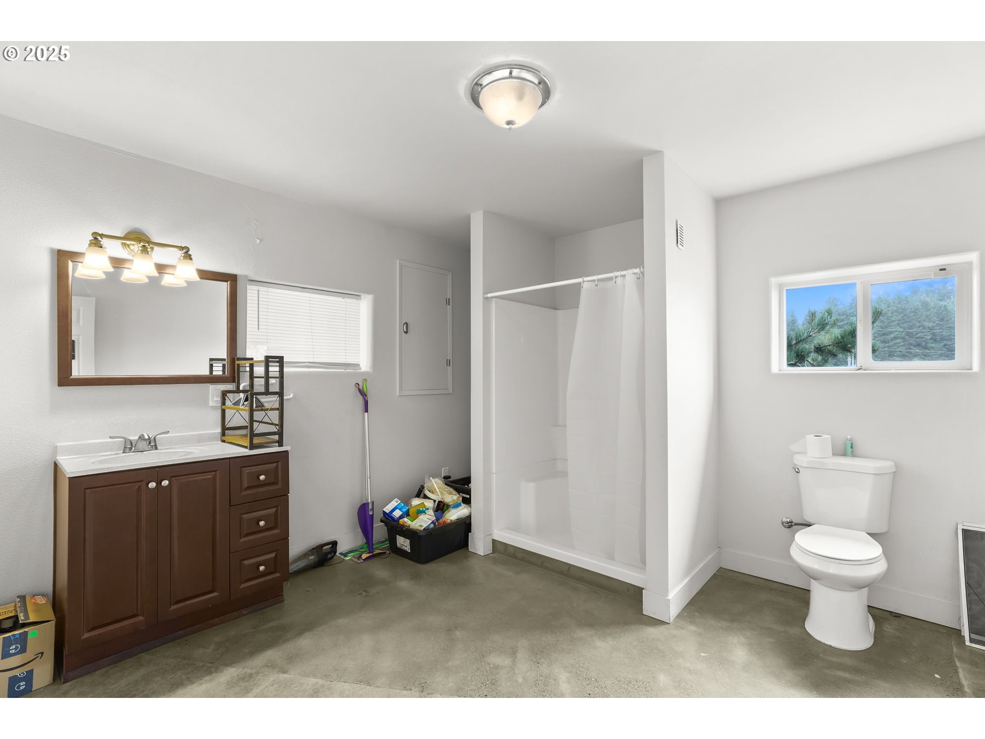 33685 Southeast Kelso Road Boring, OR 97009 - Photo 11 of 32 a bathroom with a sink vanity mirror and toilet