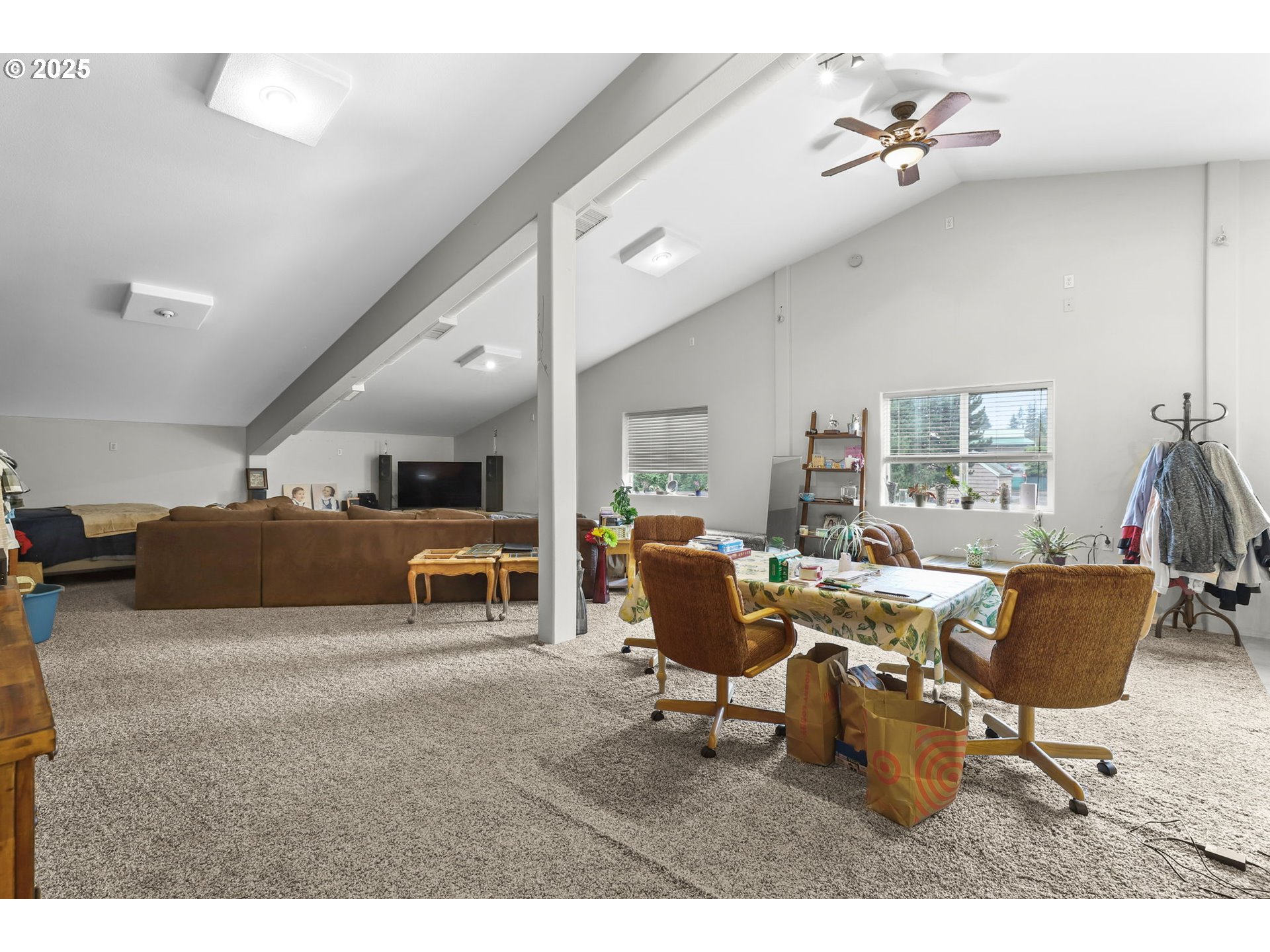 33685 Southeast Kelso Road Boring, OR 97009 - Photo 6 of 32 a living room with furniture and a flat screen tv