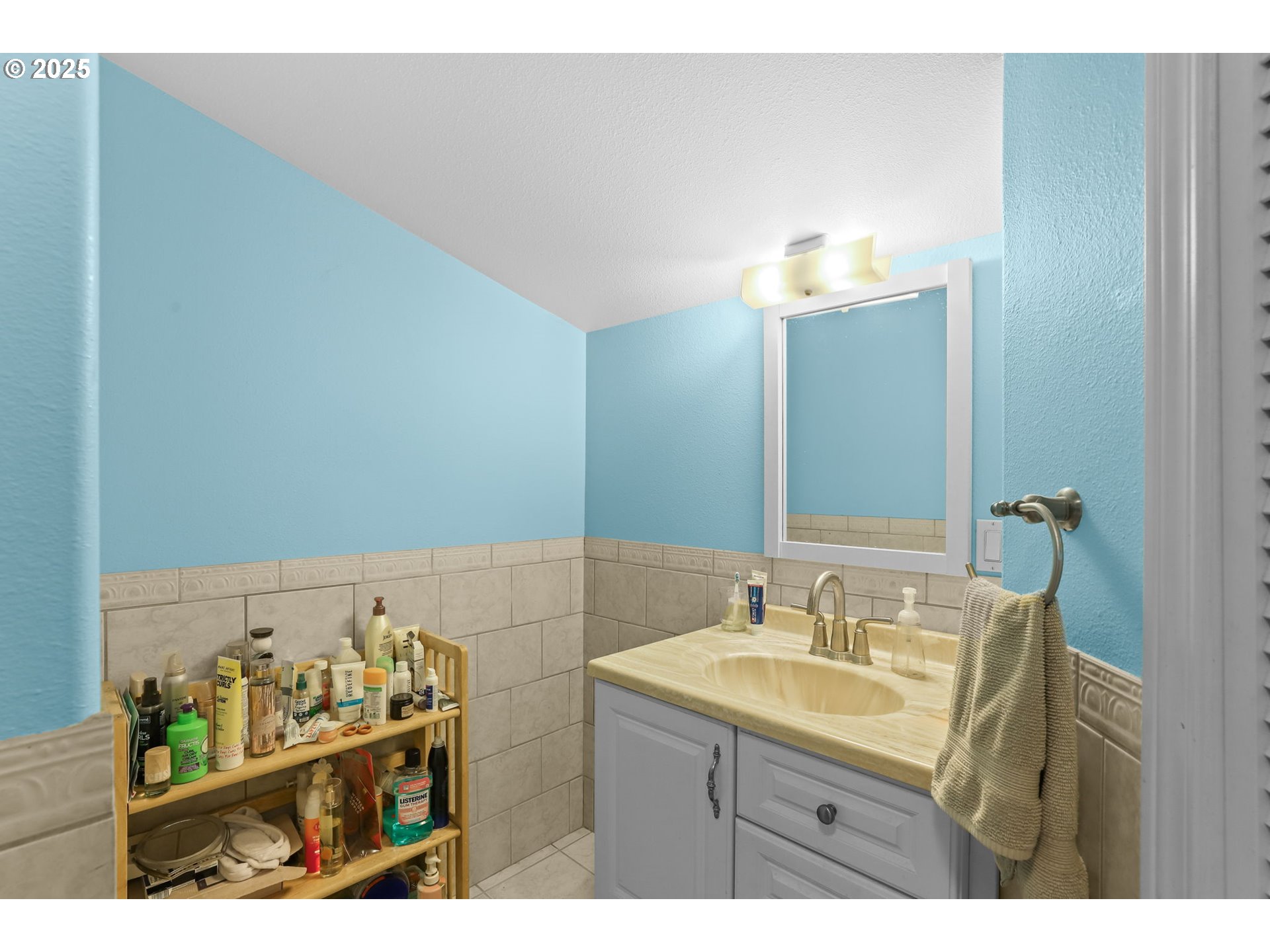 33685 Southeast Kelso Road Boring, OR 97009 - Photo 8 of 32 a bathroom with a sink vanity and a mirror